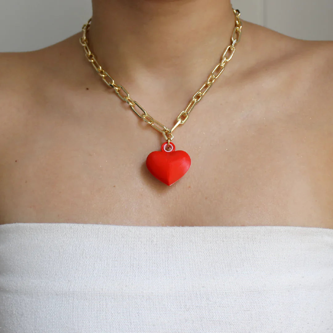 DIJE DE RELICARIO EN FORMA DE CORAZÓN