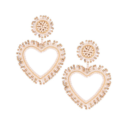 Aretes de corazones chapados en oro con flecos bordados en Miyuki